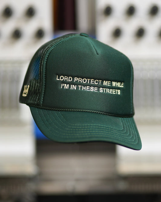 Lord Protect Me While I’m In These Streets Trucker Hat in Forest Green
