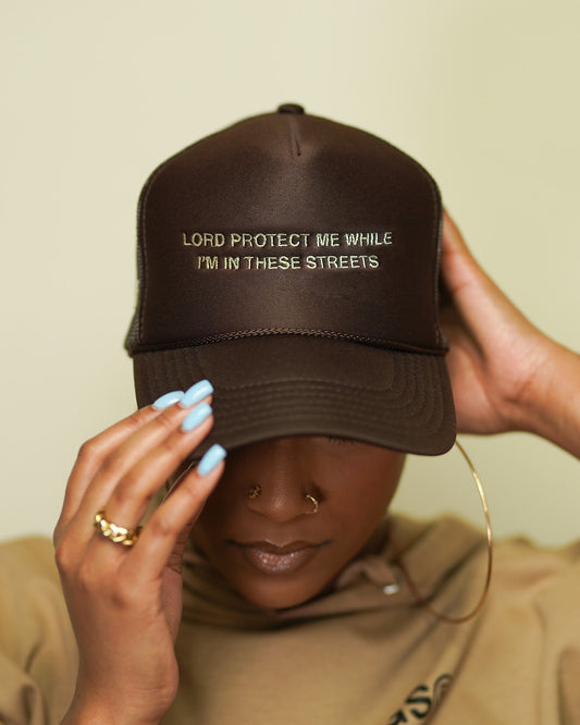 Lord Protect Me While I’m In These Streets Trucker Hat in Brown