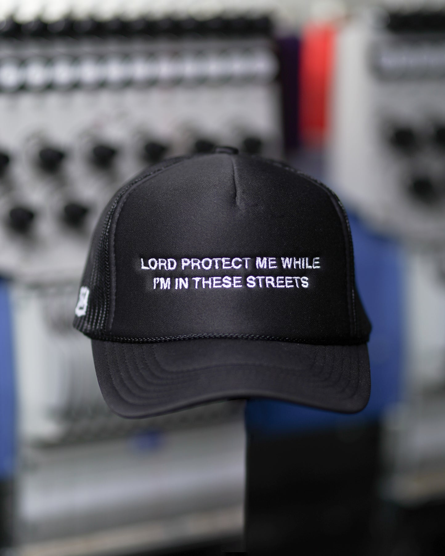 Lord Protect Me While I’m In These Streets Trucker Hat in Black